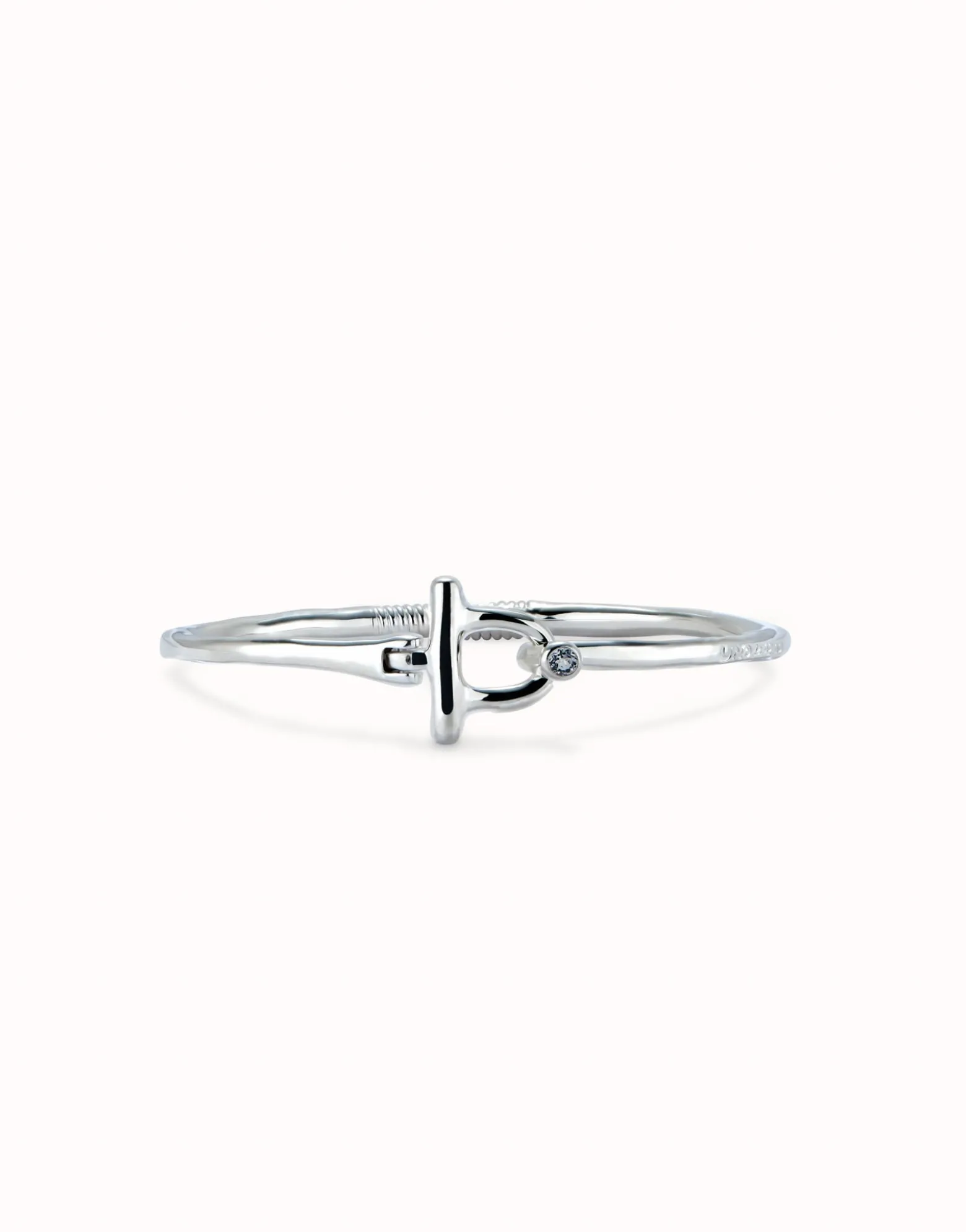 Pulsera con cierre frontal bañada en plata de ley con topacio blanco