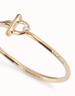Pulsera con cierre frontal bañada en oro 18k con topacio blanco