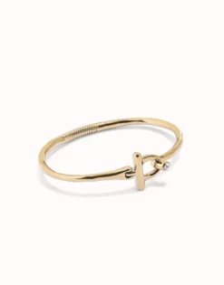 Pulsera con cierre frontal bañada en oro 18k con topacio blanco
