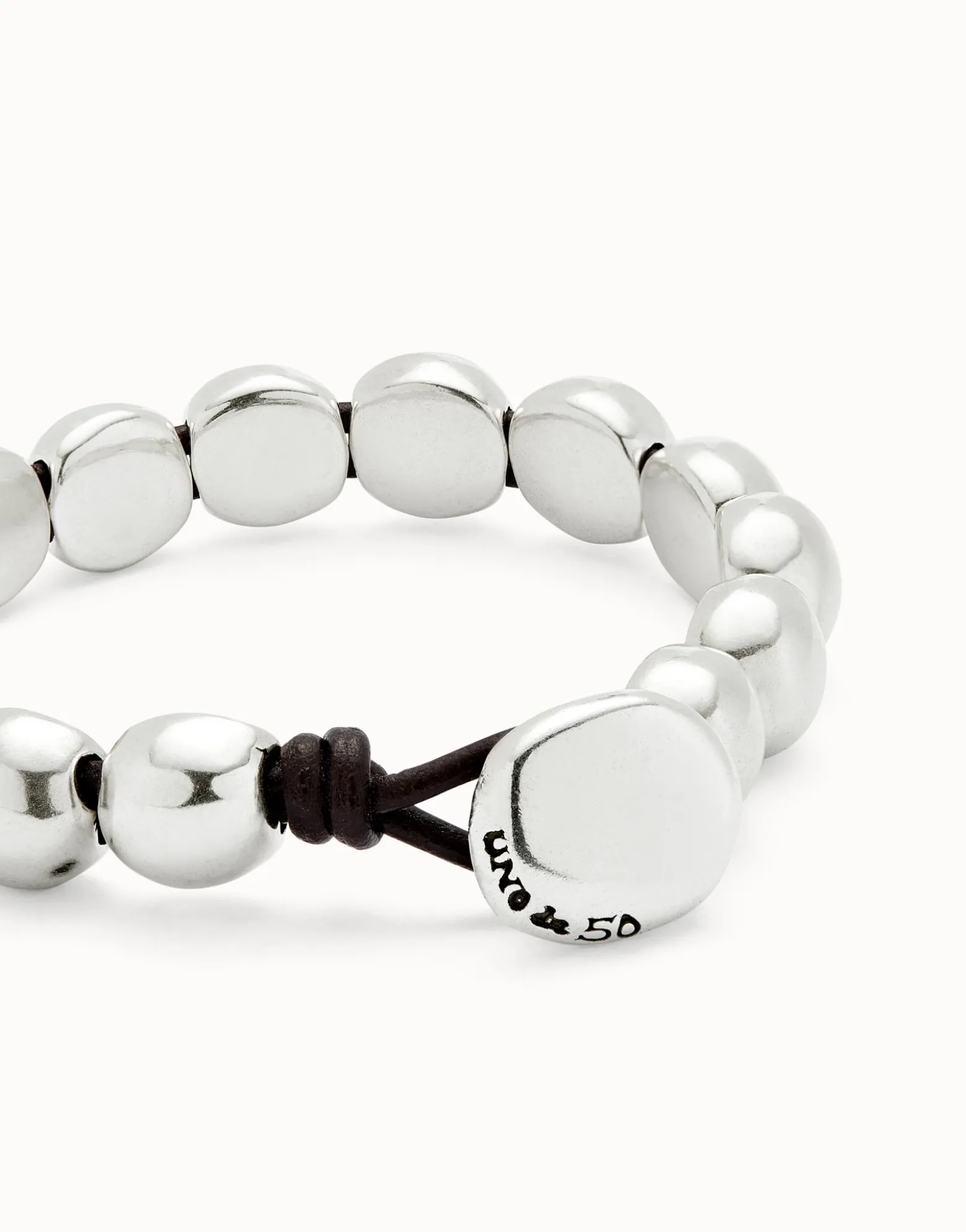 Pulsera con cuentas redondas pequeñas bañadas en plata de ley