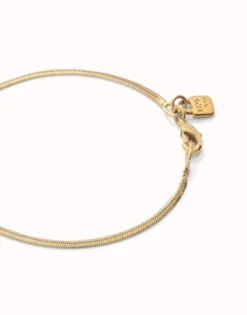 Pulsera con forma plana bañada en oro 18k