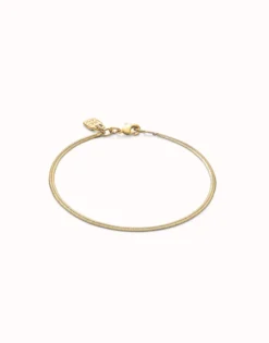 Pulsera con forma plana bañada en oro 18k