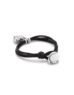 Pulsera con 4 tiras de cuero con cierre botón y charm de corazón bañado en plata de ley