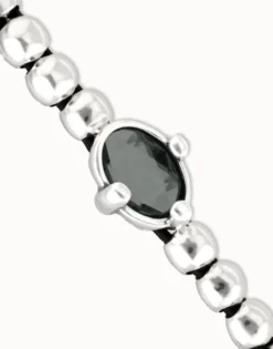 Pulsera de bolas bañada en plata con cristal facetado ovalado negro