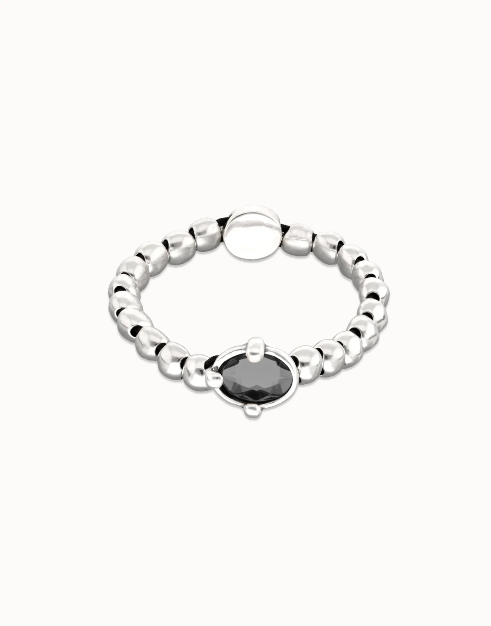 Pulsera de bolas bañada en plata con cristal facetado ovalado negro