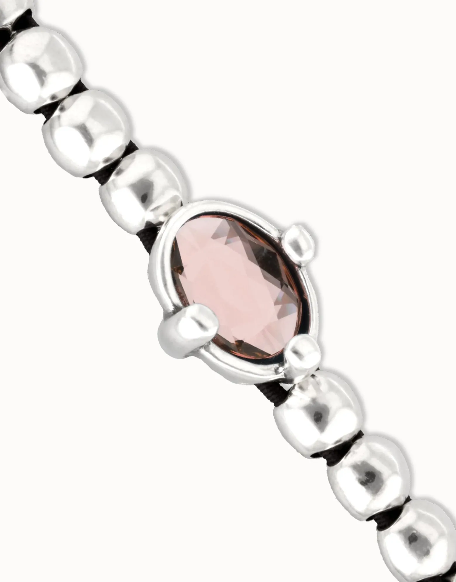 Pulsera de bolas bañada en plata con cristal facetado ovalado rosa
