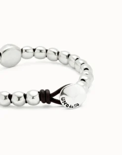 Pulsera de bolas bañadas en plata de ley y bola central de mayor tamaño
