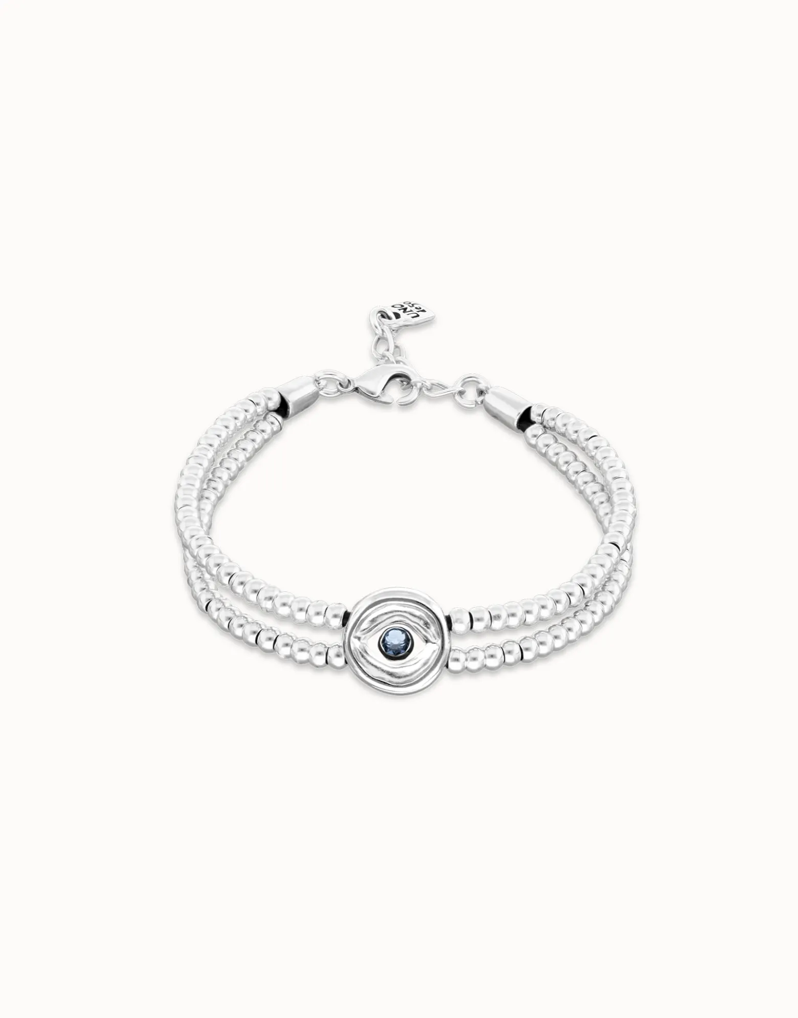 Pulsera de bolas doble bañada en plata de ley con detalle de ojo y cristal azul