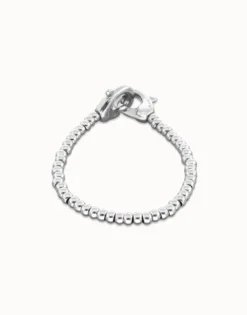 Pulsera de bolas pequeñas bañada en plata con mosquetón entrelazado