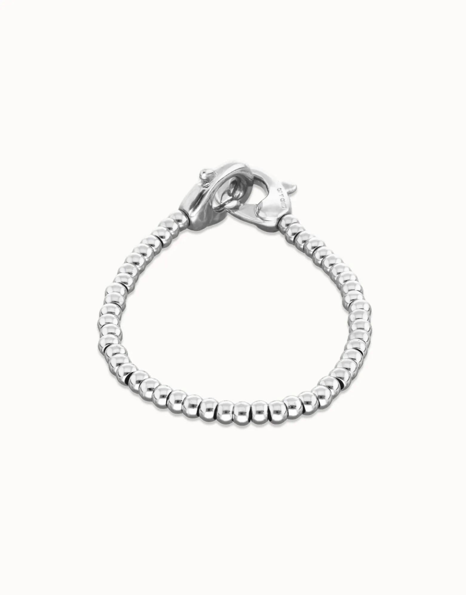 Pulsera de bolas pequeñas bañada en plata con mosquetón entrelazado