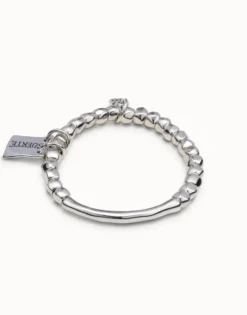 Pulsera de cuentas, pieza tubular y chapa con mensaje bañado en plata