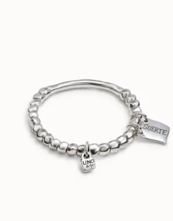 Pulsera de cuentas, pieza tubular y chapa con mensaje bañado en plata