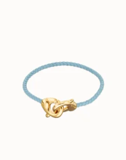 Pulsera de cuero azul con mosquetón entrelazado en oro