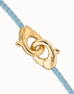 Pulsera de cuero azul con mosquetón entrelazado en oro