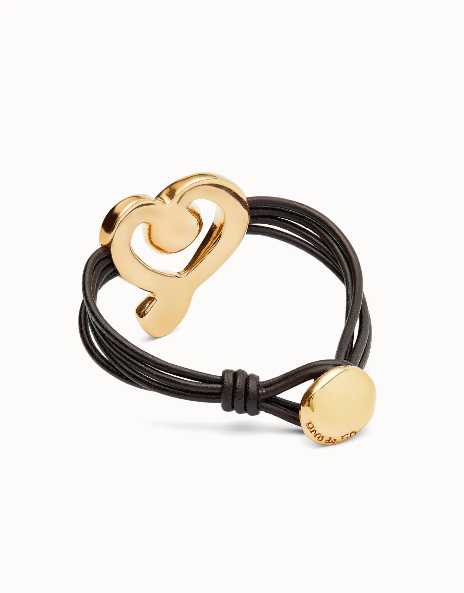 Pulsera de cuero con corazón bañado en oro 18k con cristal negro