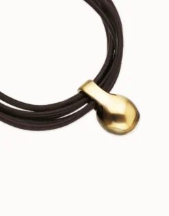 Pulsera de cuero con esfera bañada en oro 18k