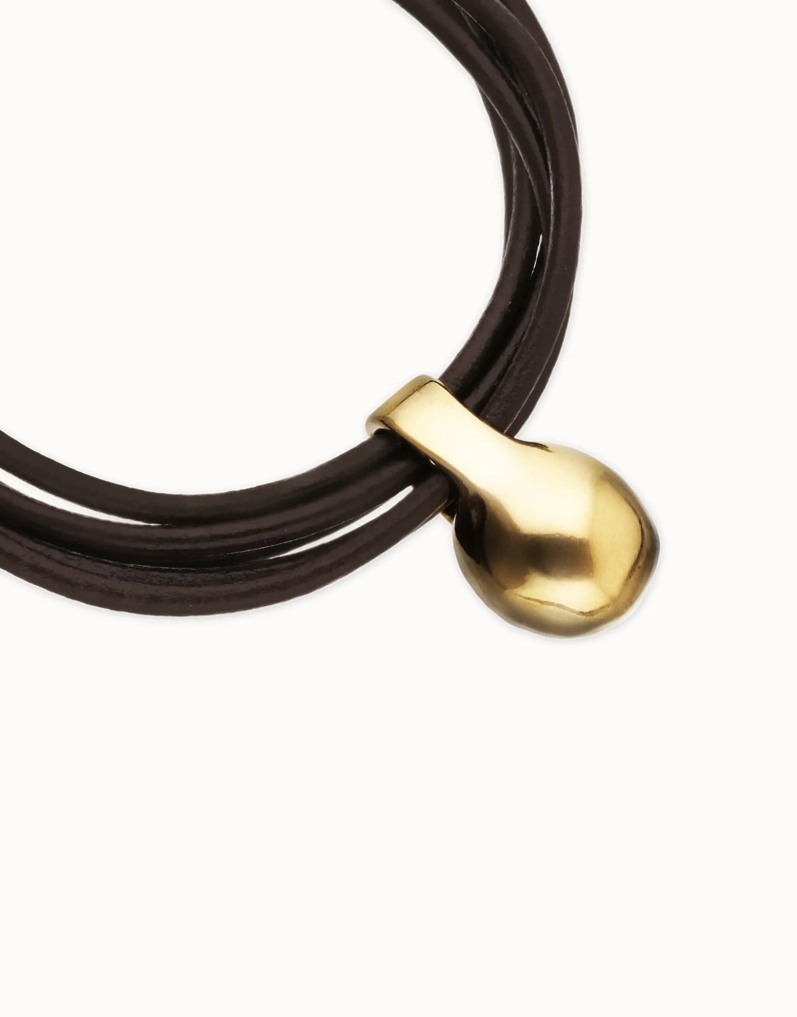 Pulsera de cuero con esfera bañada en oro 18k