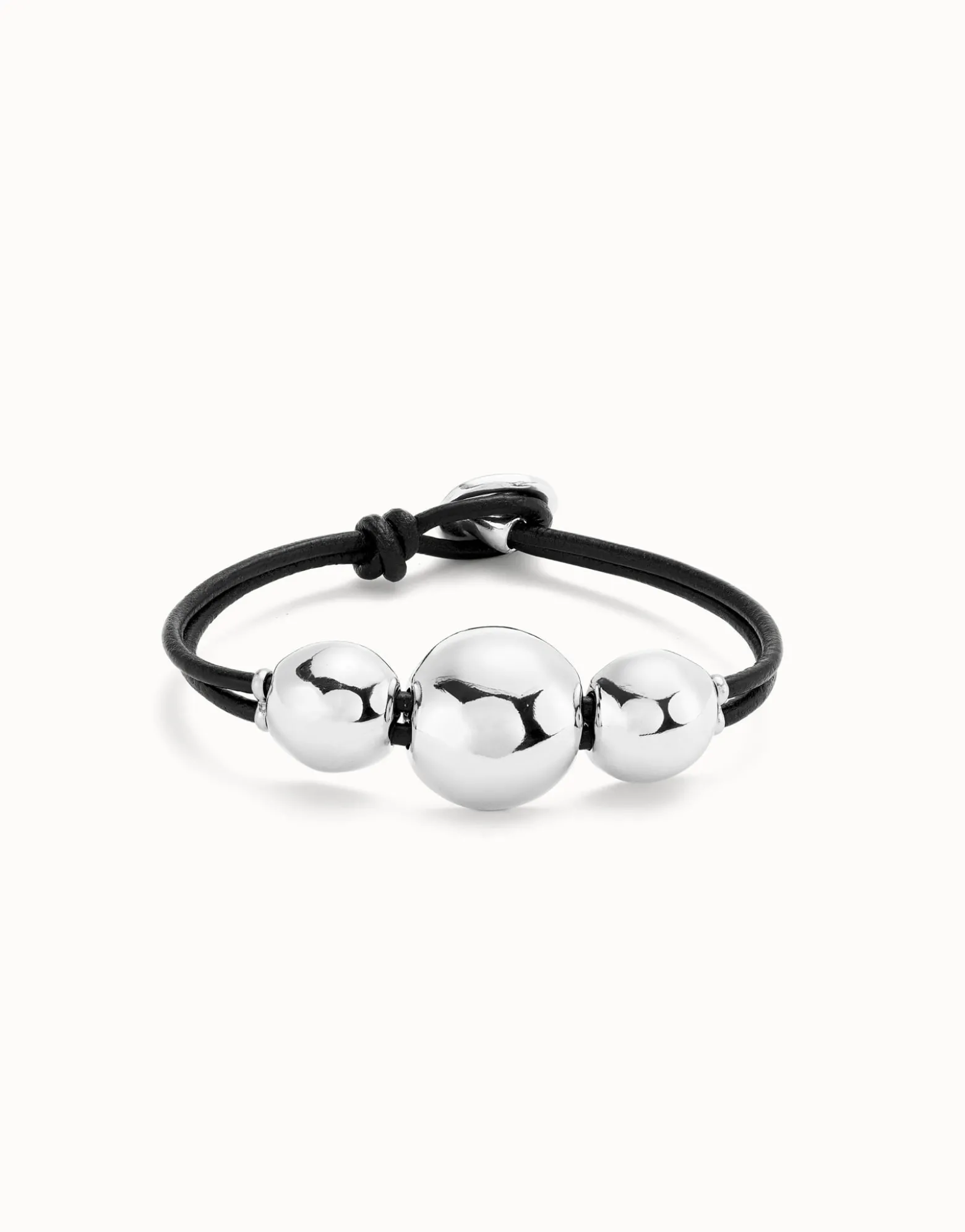 Pulsera de cuero con tres bolas grandes bañadas en plata de ley