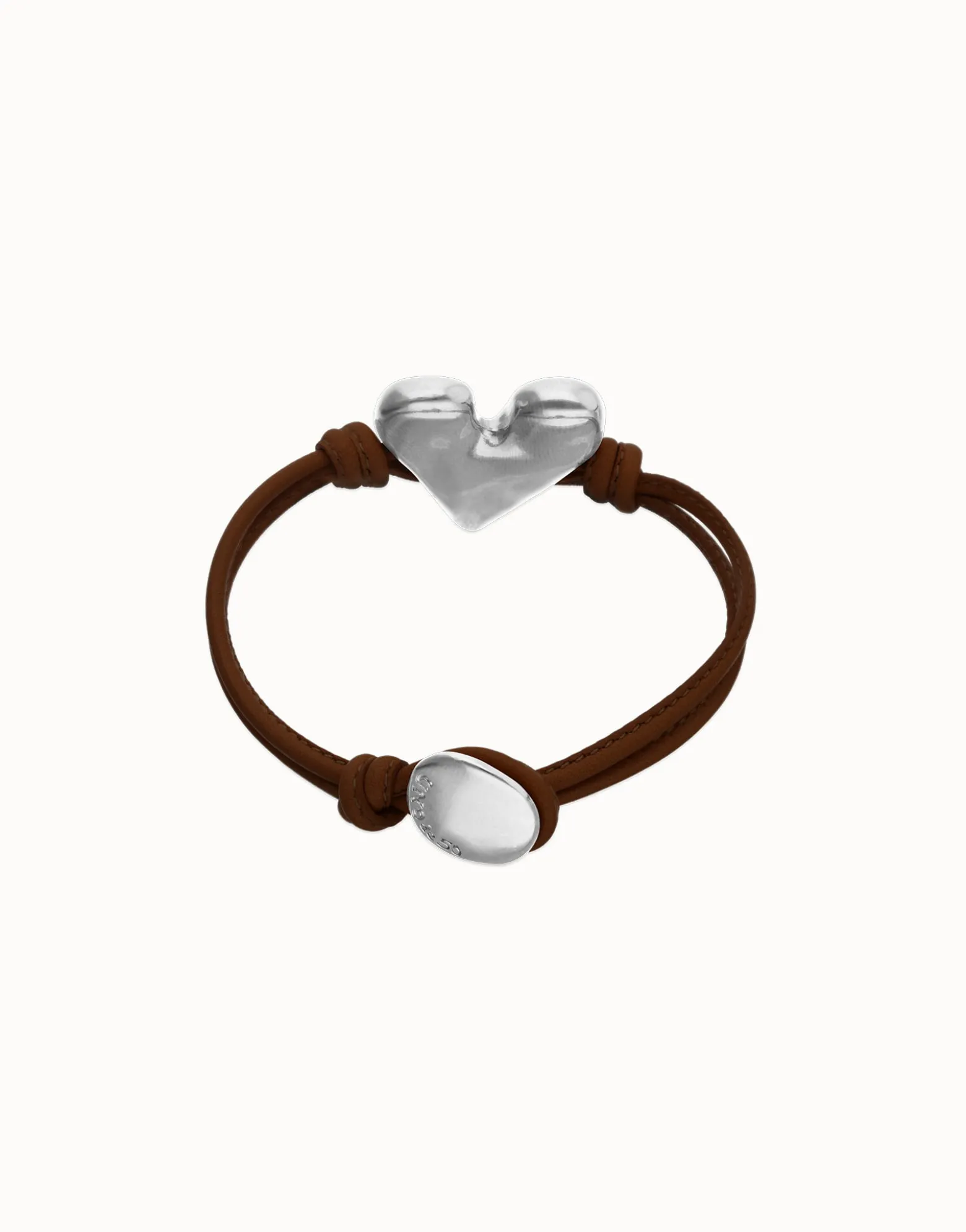 Pulsera de cuero marrón con detalle de corazón bañado en plata de ley
