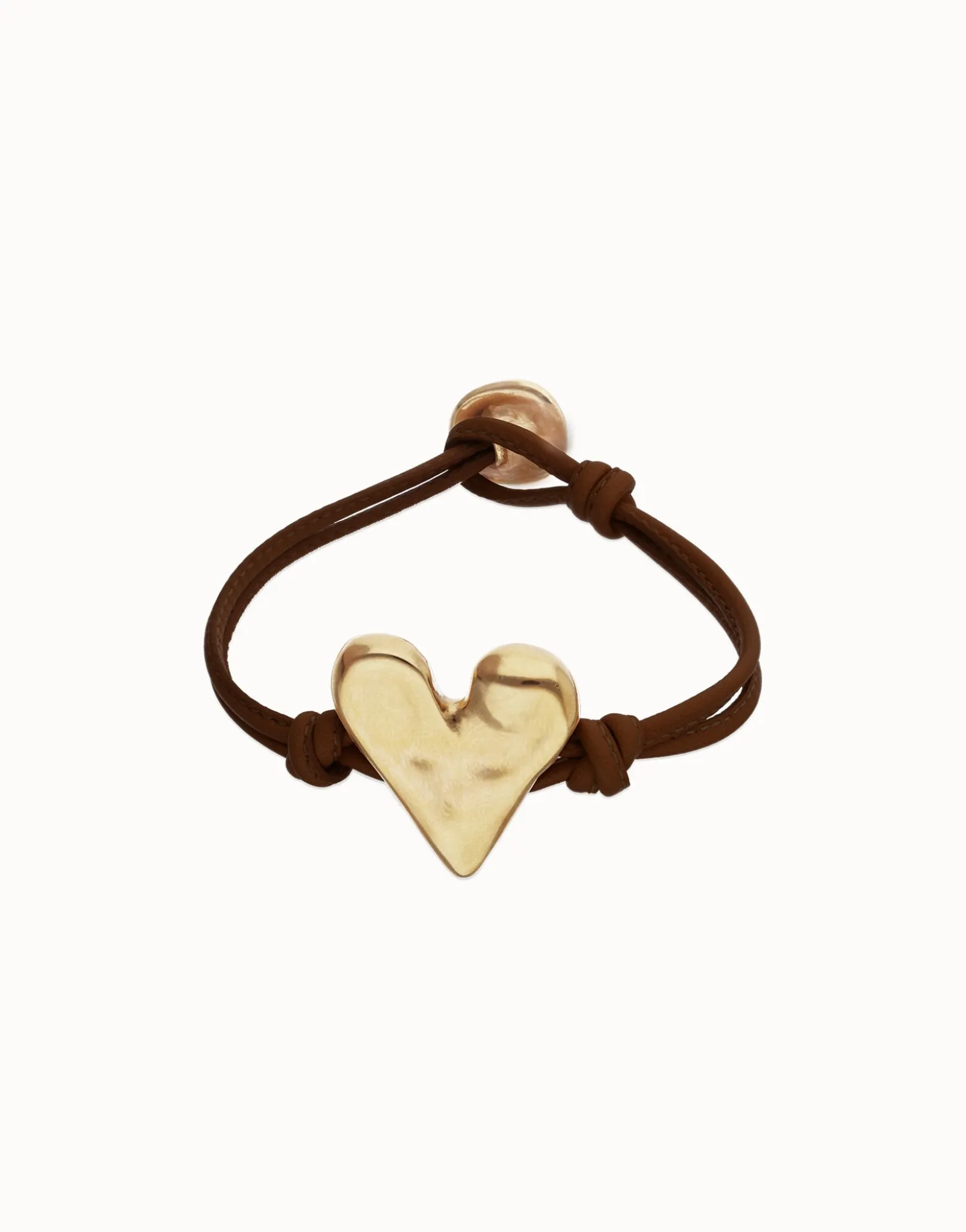 Pulsera de cuero marrón con detalle de corazón bañado en oro 18k
