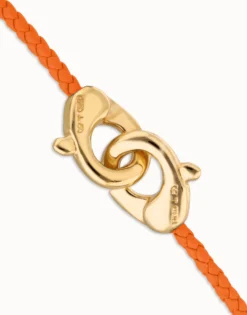 Pulsera de cuero naranja con mosquetón entrelazado en oro