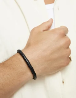 Pulsera de cuero trenzada con cierre dorado