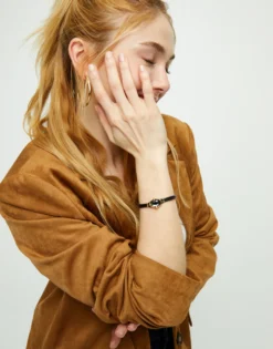 Pulsera de cuero y baño en 18k con cristal facetado ovalado negro