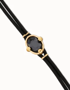 Pulsera de cuero y baño en 18k con cristal facetado ovalado negro