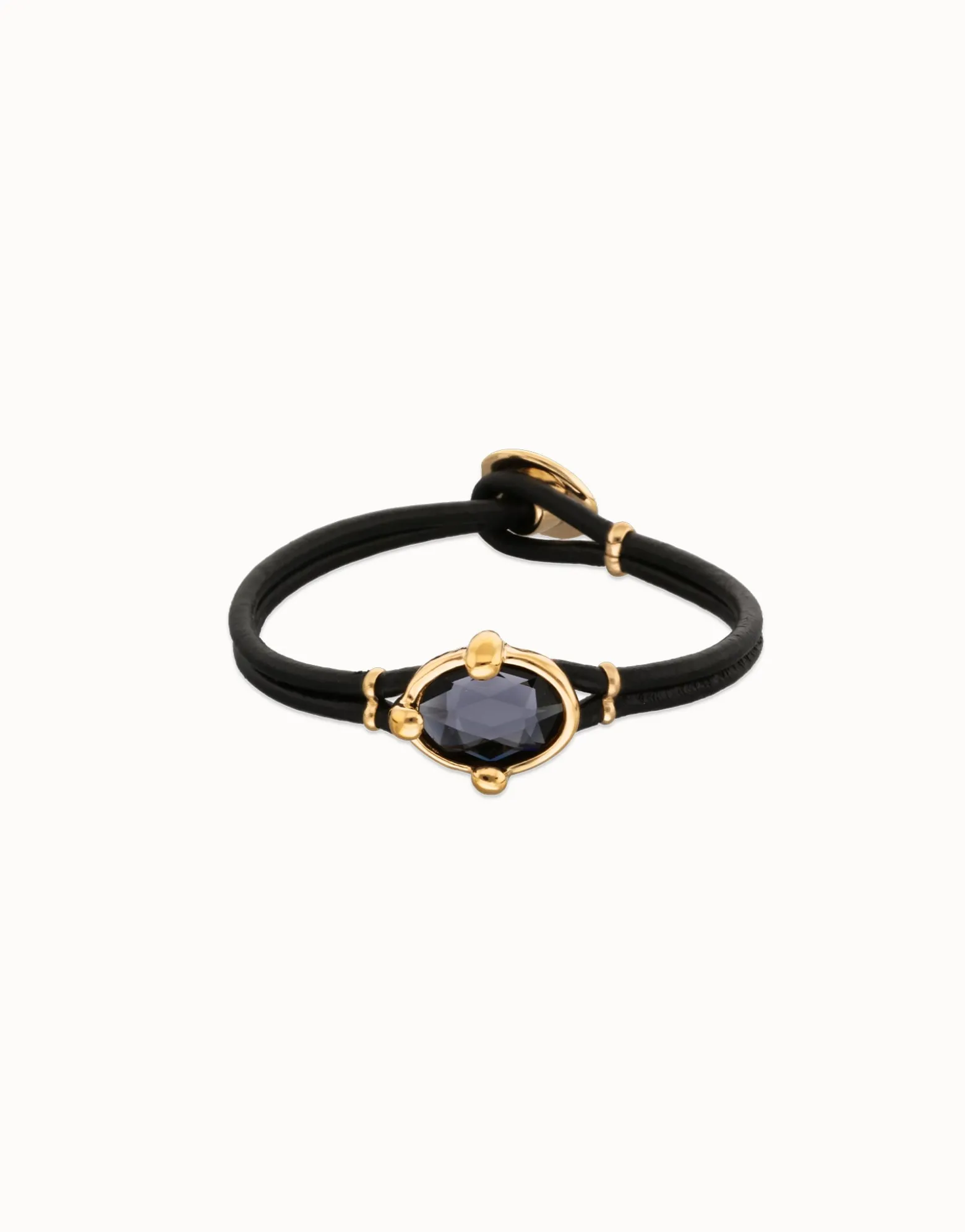 Pulsera de cuero y baño en 18k con cristal facetado ovalado negro