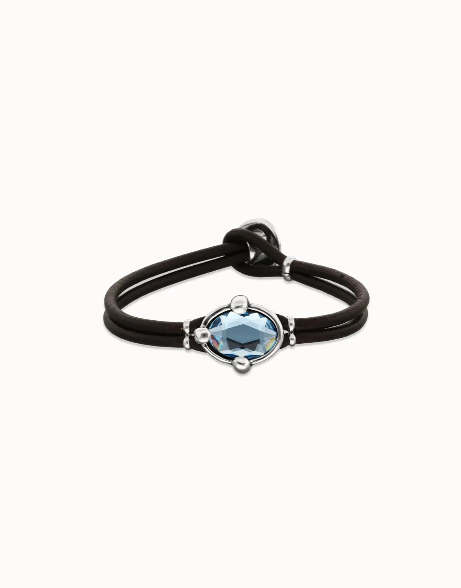 Pulsera de cuero y baño en plata con cristal facetado ovalado azul