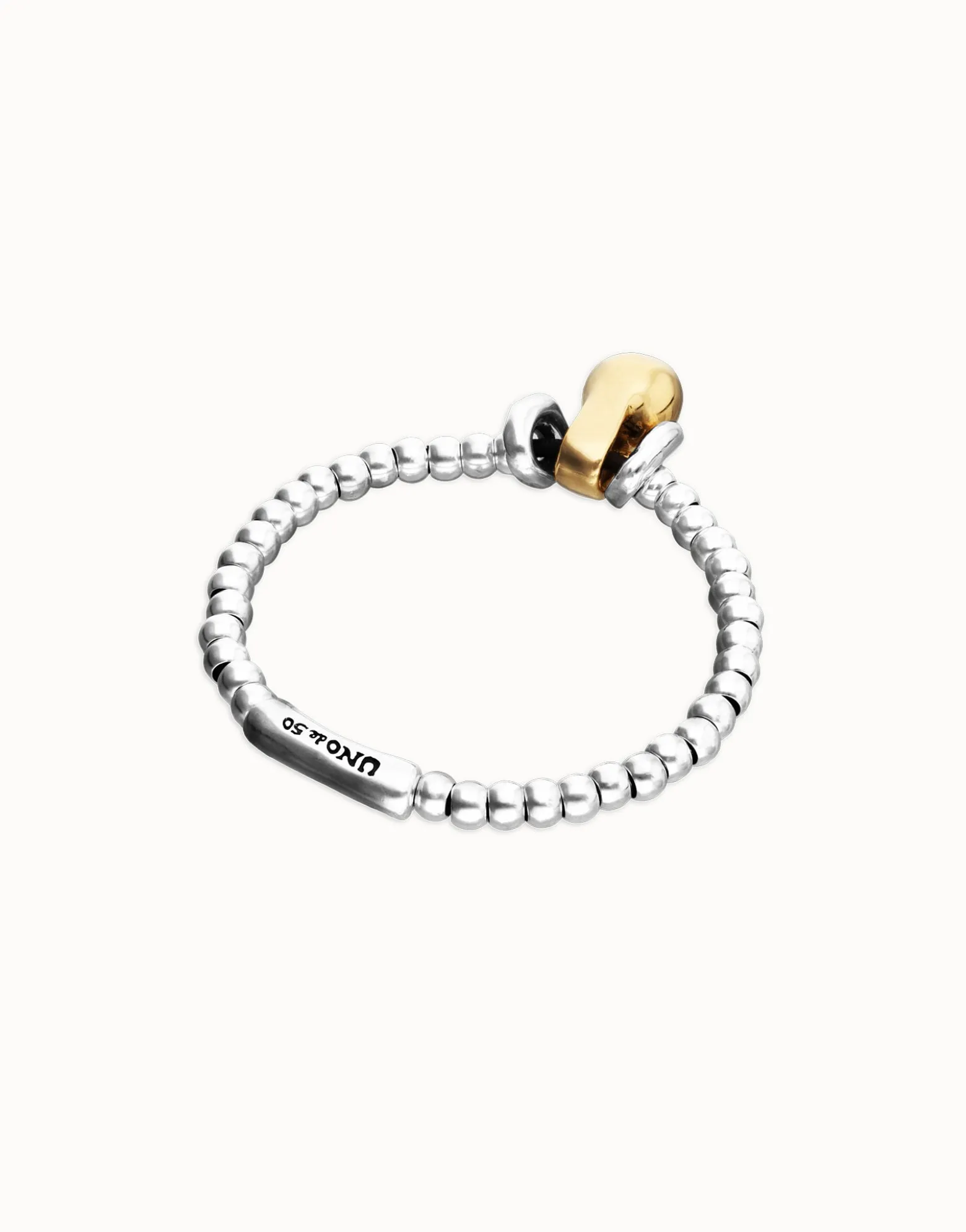 Pulsera de esferas en combinación de baño oro y plata