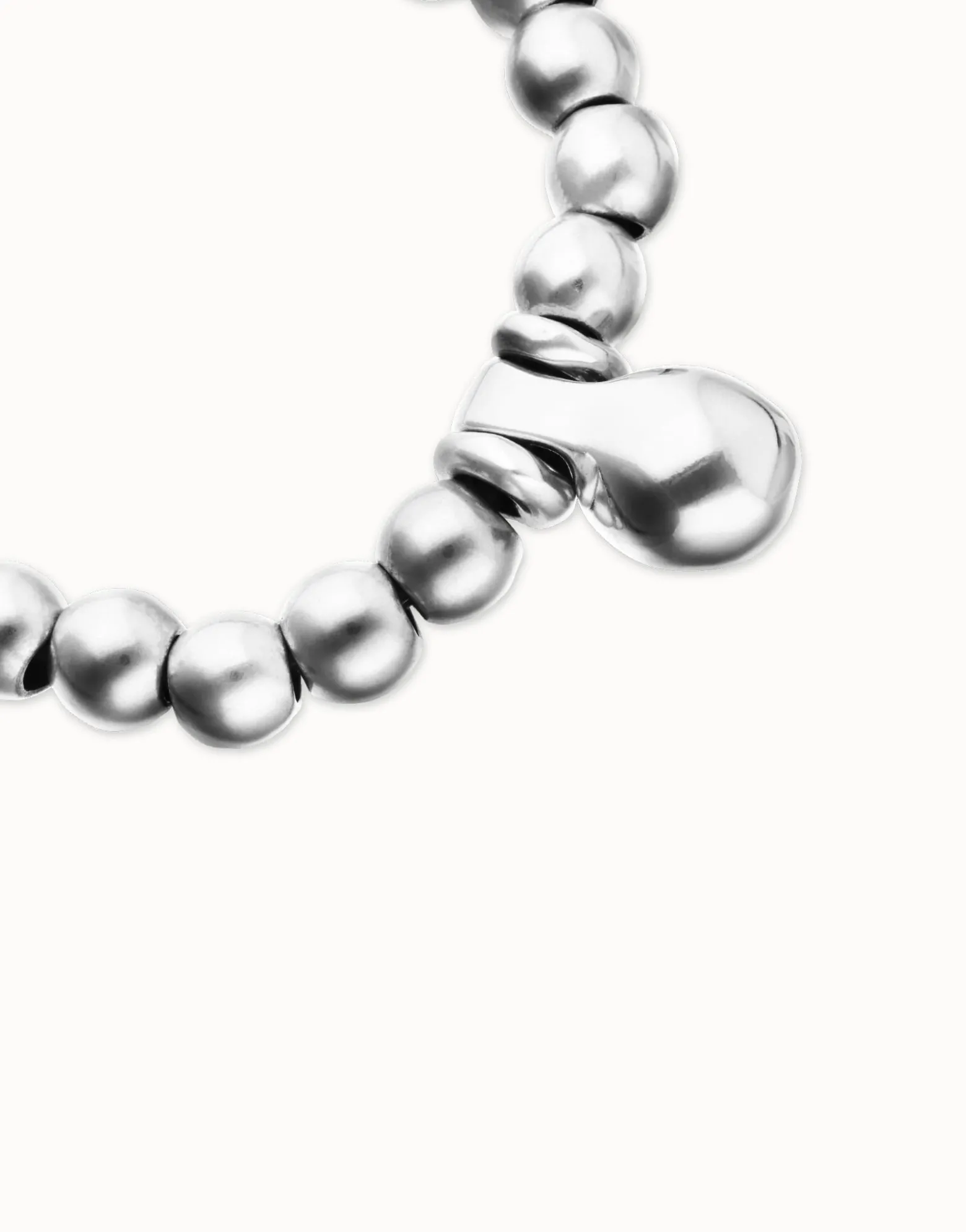 Pulsera de esferas medianas bañadas en plata de ley y esfera grande