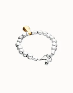 Pulsera de esferas medianas combinando baño en oro y en plata