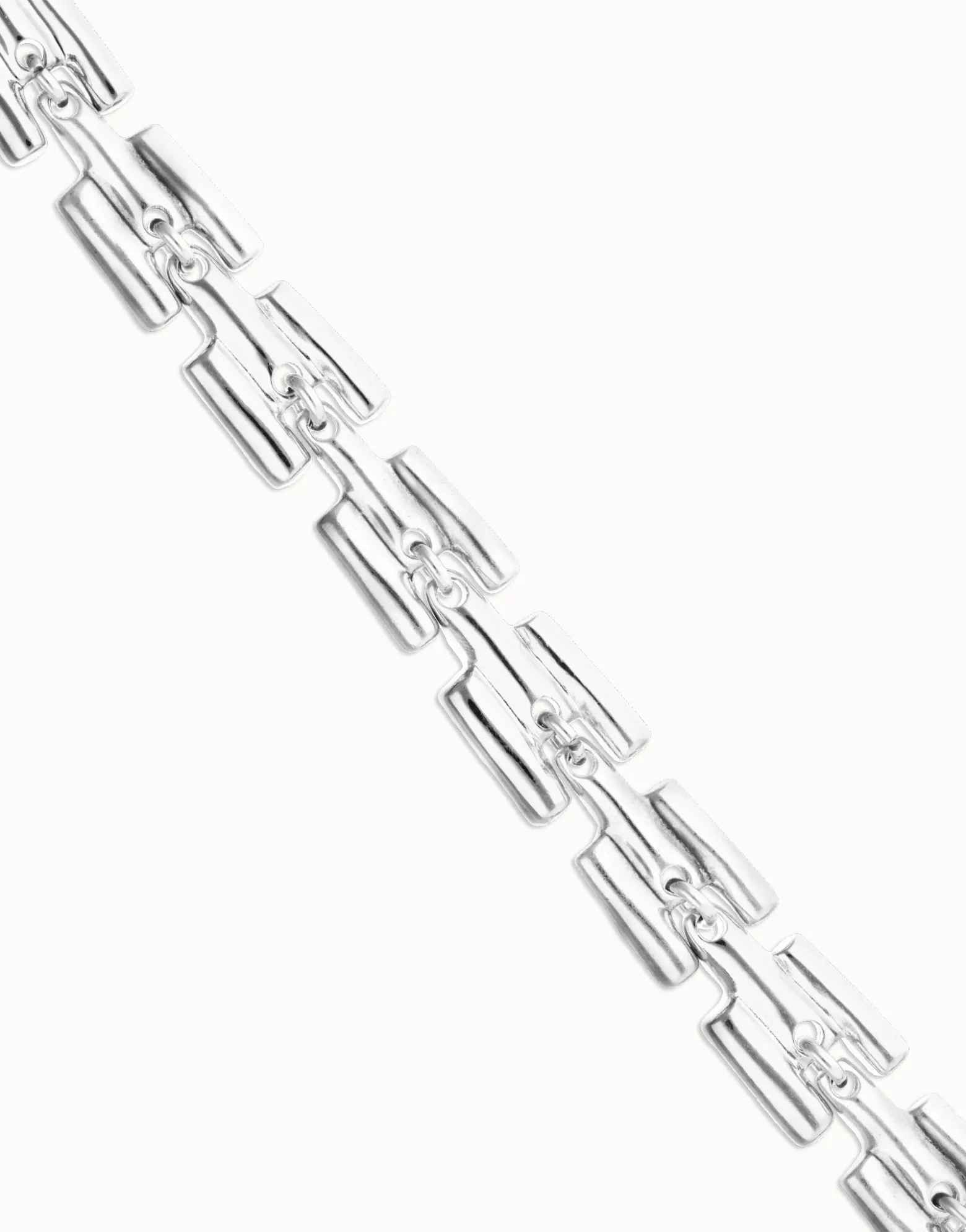 Pulsera de eslabones bañada en plata de ley con piezas cilíndricas