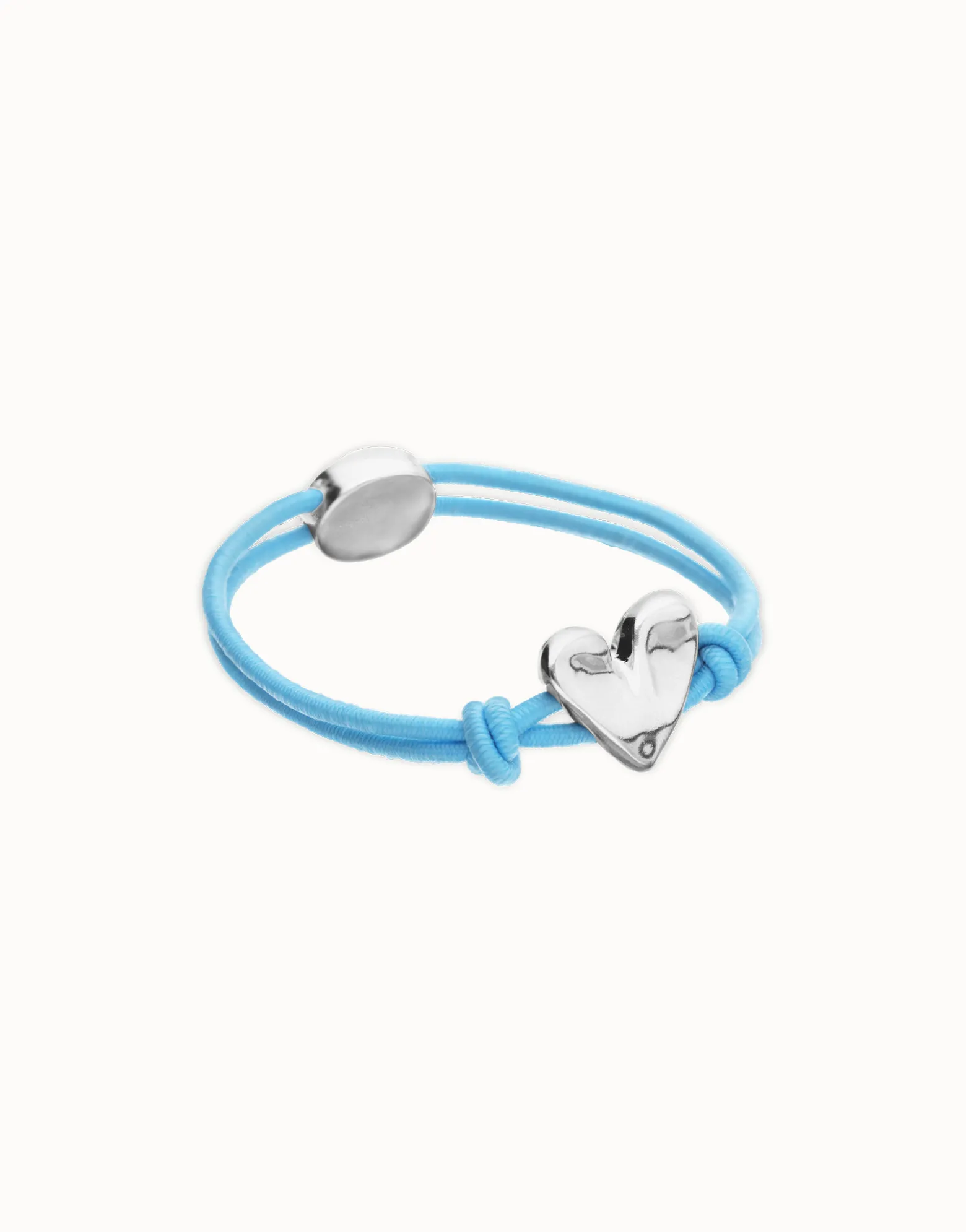 Pulsera de hilo elástico azul con corazón bañado en plata de ley