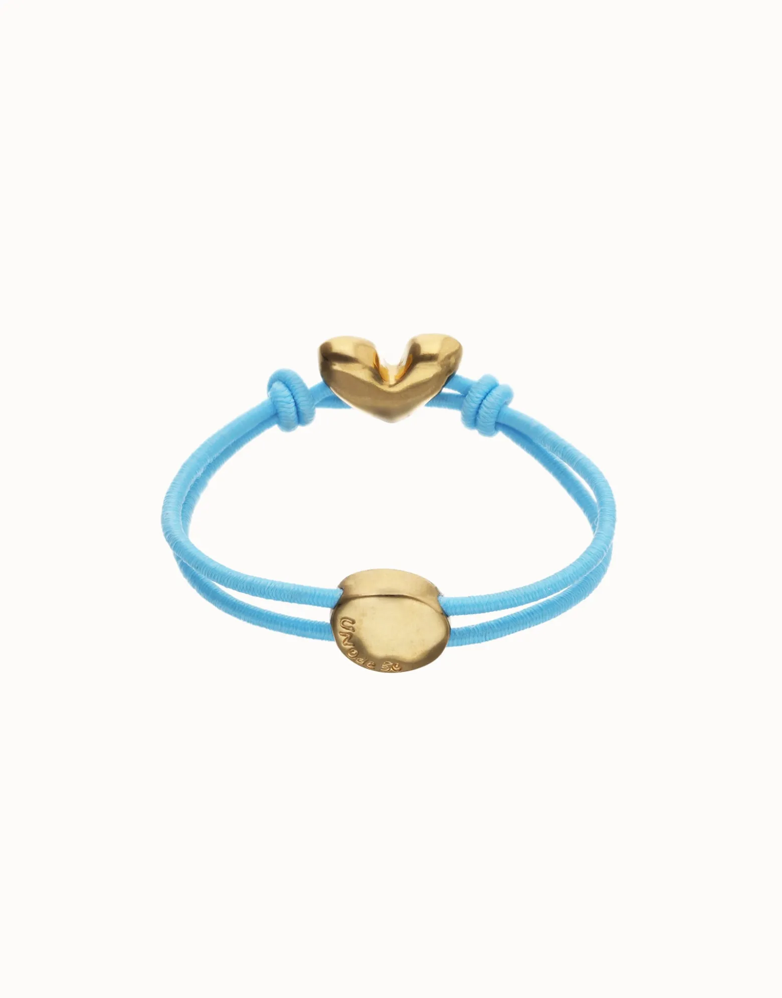 Pulsera de hilo elástico azul con corazón bañado en oro 18k