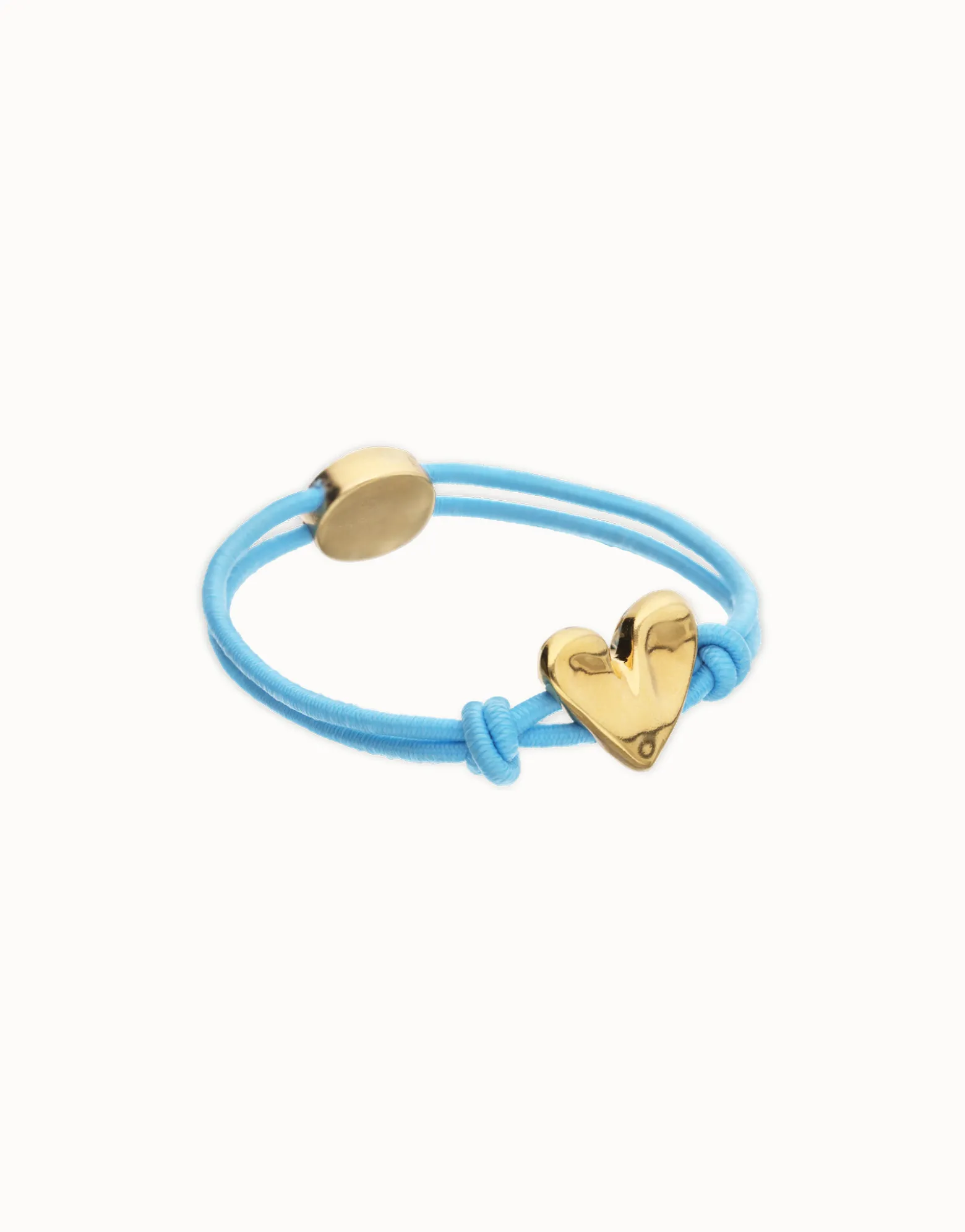 Pulsera de hilo elástico azul con corazón bañado en oro 18k