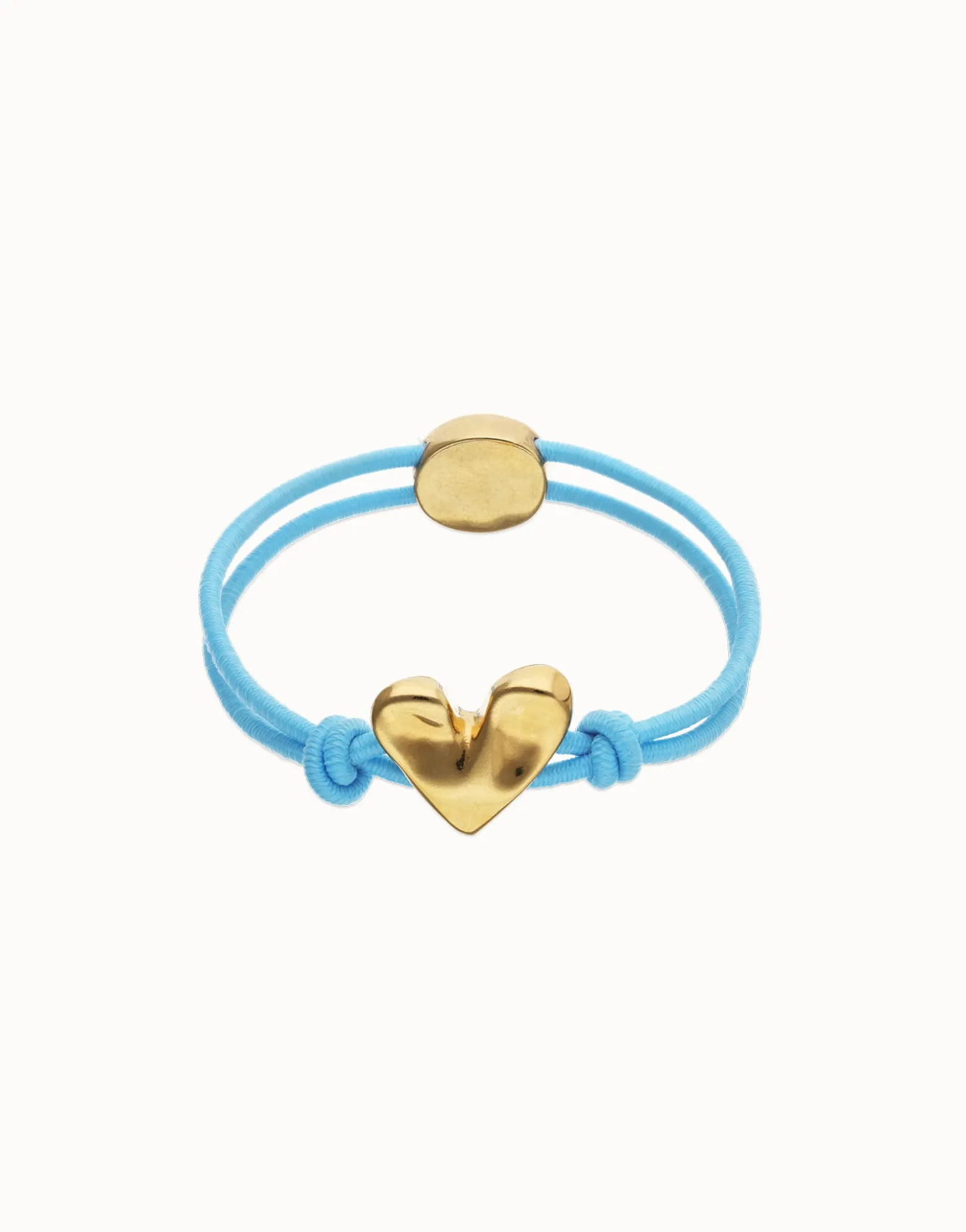 Pulsera de hilo elástico azul con corazón bañado en oro 18k