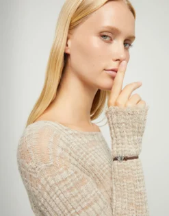 Pulsera de hilo elástico marrón con corazón bañado en plata de ley