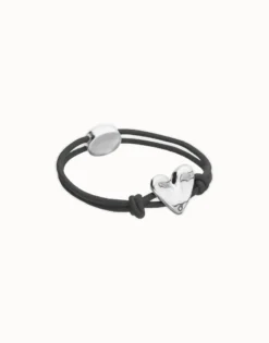 Pulsera de hilo elástico negro con corazón bañado en plata de ley