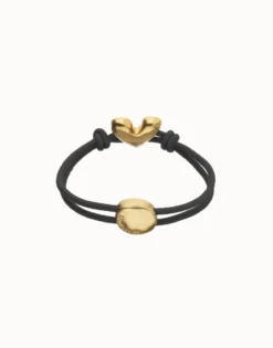 Pulsera de hilo elástico negro con corazón bañado en oro 18k