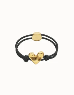 Pulsera de hilo elástico negro con corazón bañado en oro 18k
