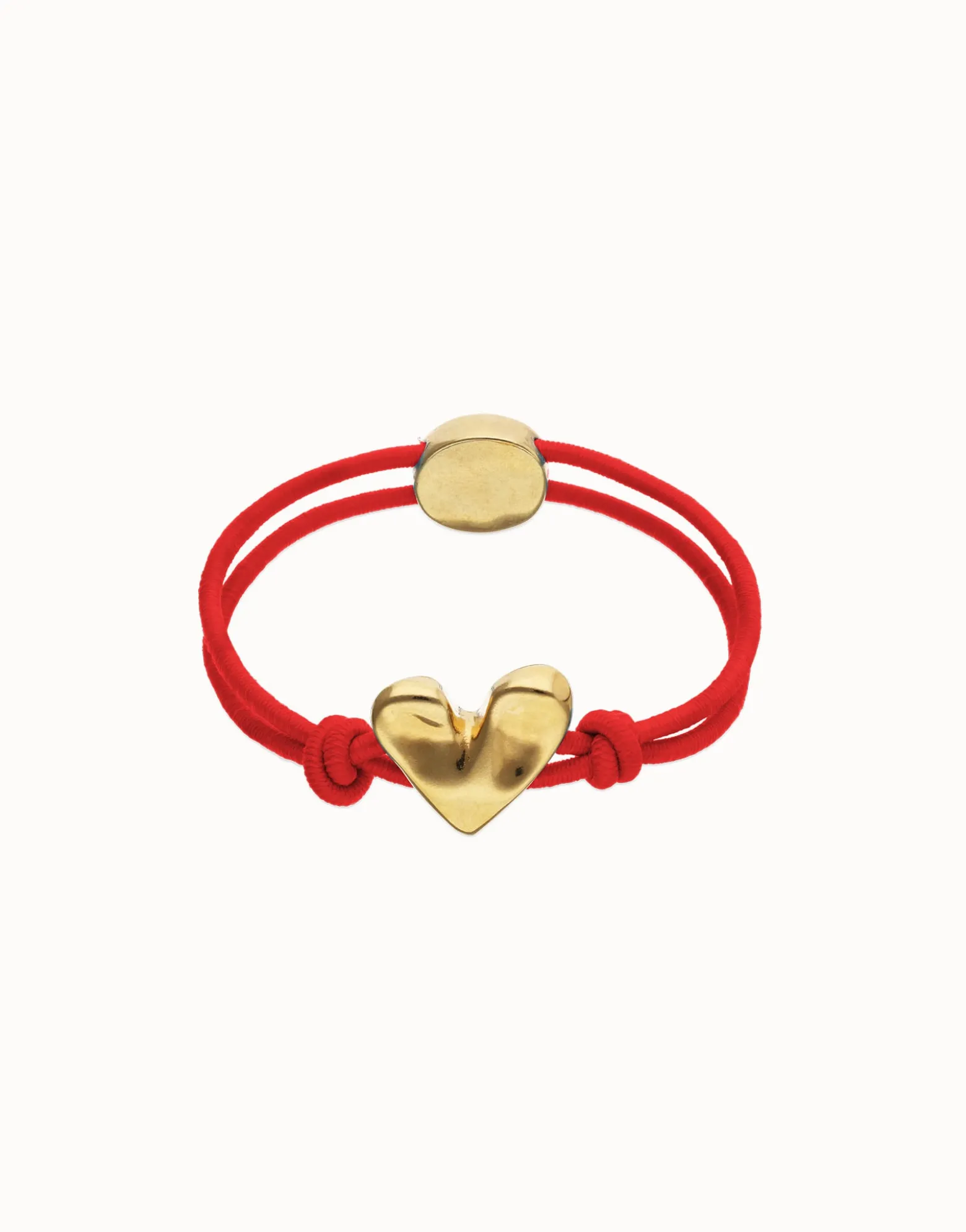 Pulsera de hilo elástico rojo con corazón bañado en oro 18k