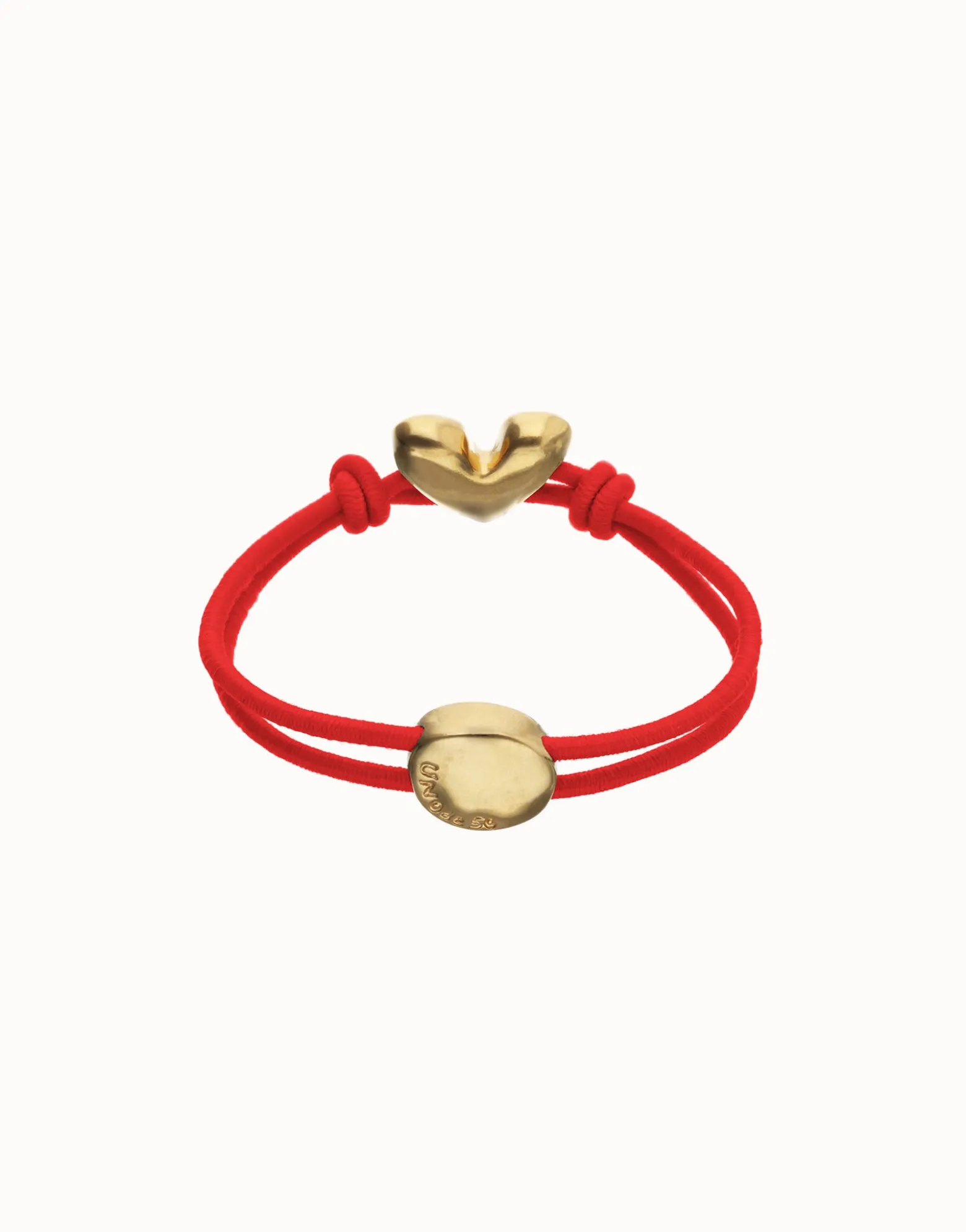 Pulsera de hilo elástico rojo con corazón bañado en oro 18k