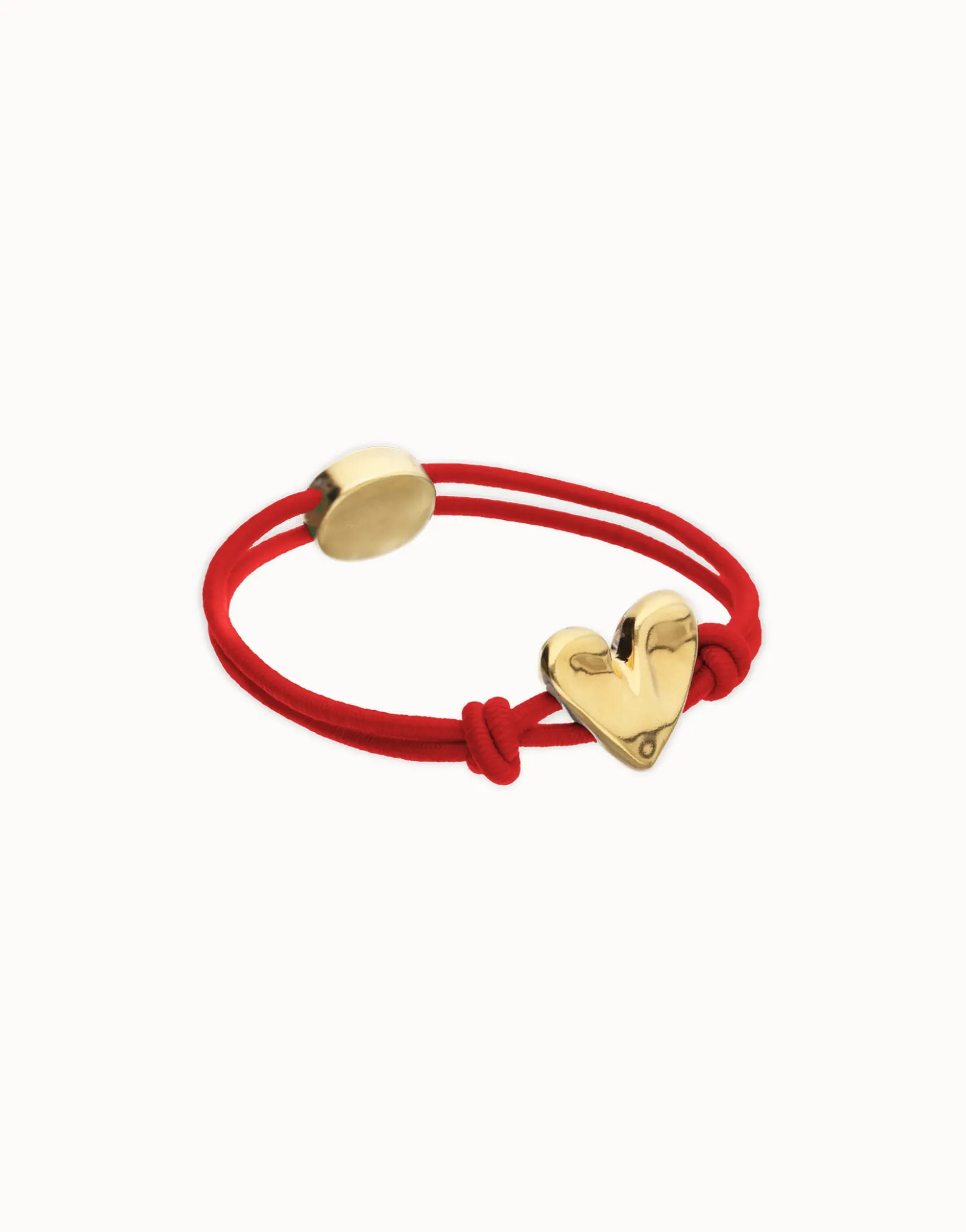 Pulsera de hilo elástico rojo con corazón bañado en oro 18k