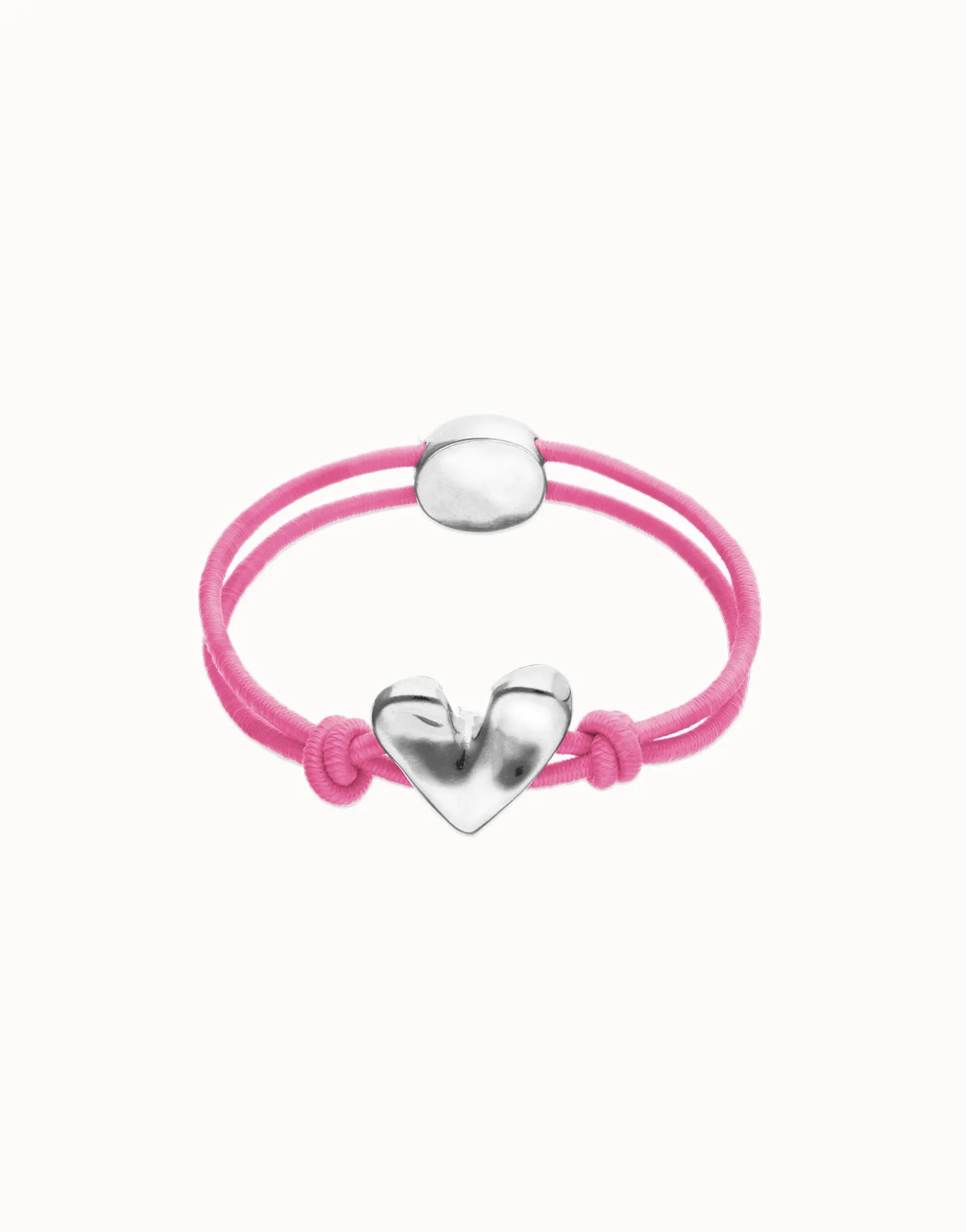 Pulsera de hilo elástico rosa con corazón bañado en plata de ley