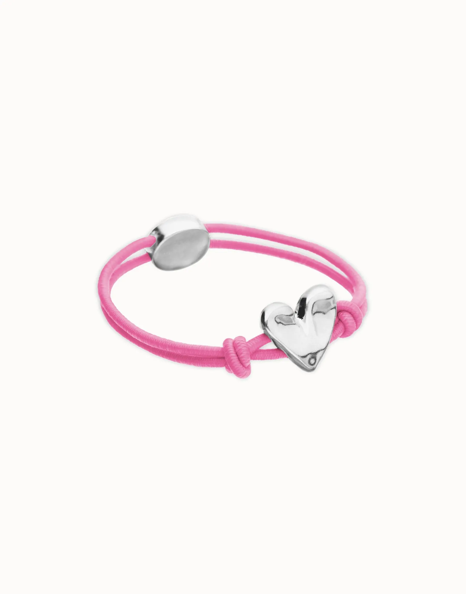 Pulsera de hilo elástico rosa con corazón bañado en plata de ley