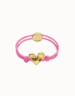 Pulsera de hilo elástico rosa con corazón bañado en oro 18k