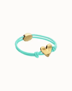 Pulsera de hilo elástico turquesa con corazón bañado en oro 18k