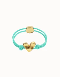 Pulsera de hilo elástico turquesa con corazón bañado en oro 18k